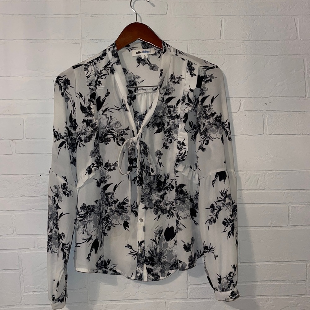 Black and white floral blouse.